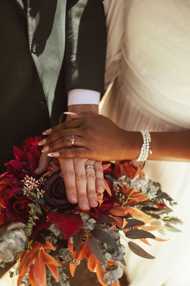 Bridal bouquet in rust, burgundy, and cinnamon orange hues1024-1200