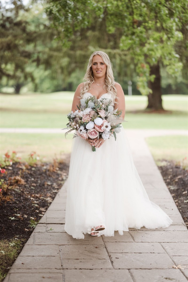 Blush pink and beige wedding bouquet with white blooms and airy greenery accents1365-1200.293040293
