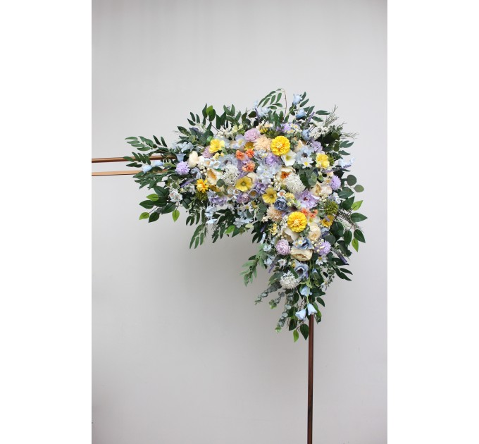 Wildflower arch flowers in yellow, ivory, dusty blue and lavender