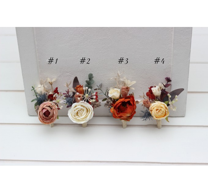 Wedding boutonnieres and wrist corsage in rust orange cream color scheme. Flower accessories. 5179