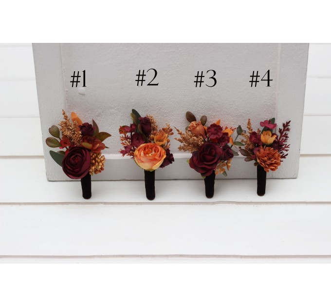 Wedding boutonnieres and wrist corsage in burgundy orange rust brown color scheme. Flower accessories. 5330