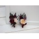 Burgundy boutoniere =17.00 USD