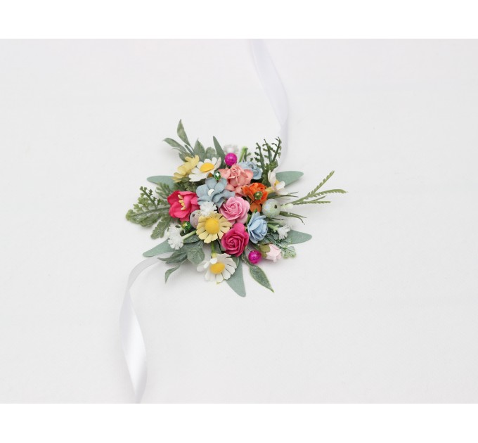 Colorful wrist corsage with wildflowers