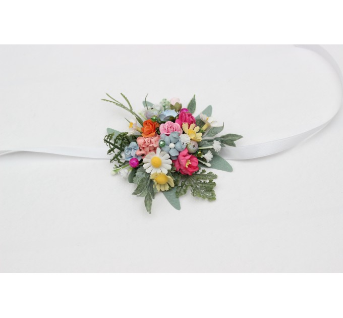 Colorful wrist corsage with wildflowers