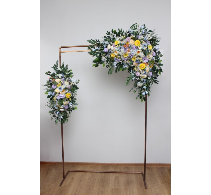 Wildflower arch flowers in yellow, ivory, dusty blue and lavender
