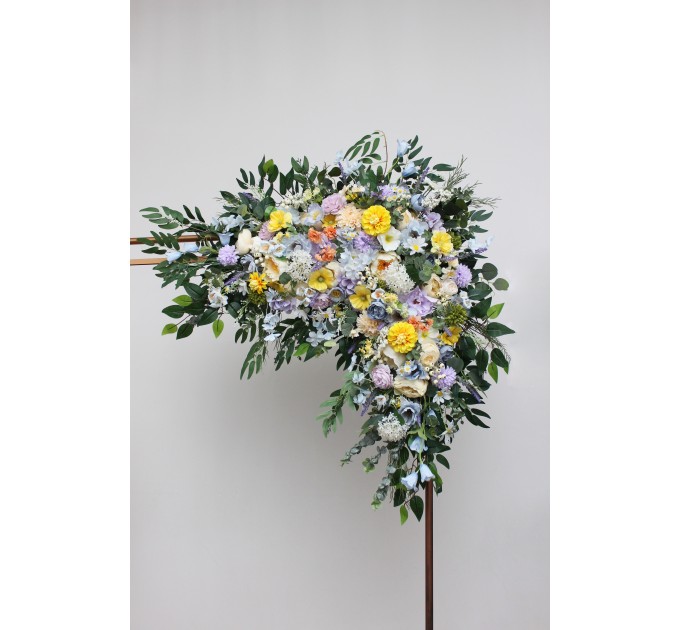 Wildflower arch flowers in yellow, ivory, dusty blue and lavender