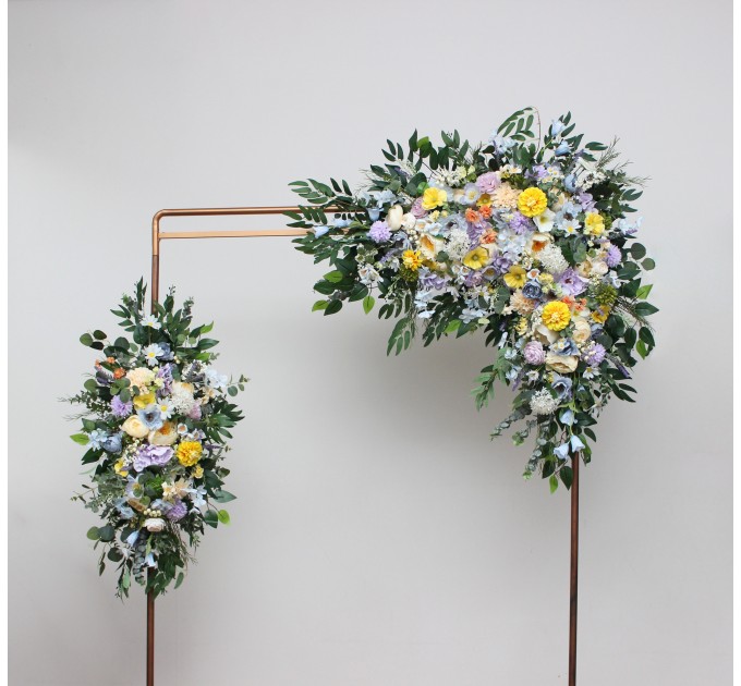 Wildflower arch flowers in yellow, ivory, dusty blue and lavender