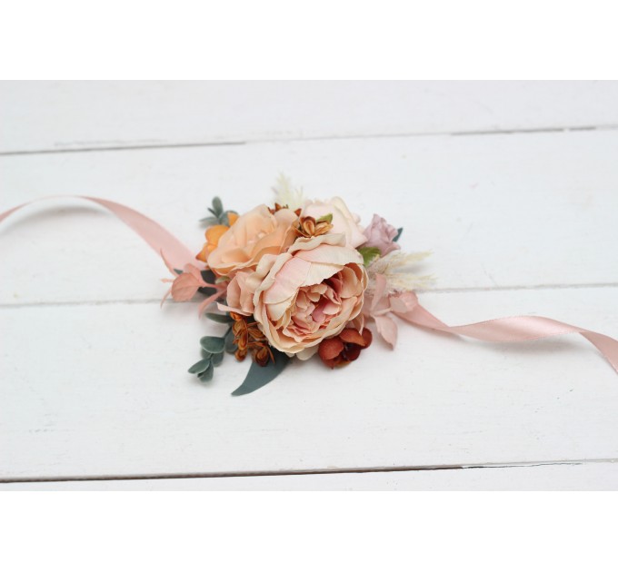 Wedding boutonnieres and wrist corsage in orange blush pink color scheme. Flower accessories. 5071