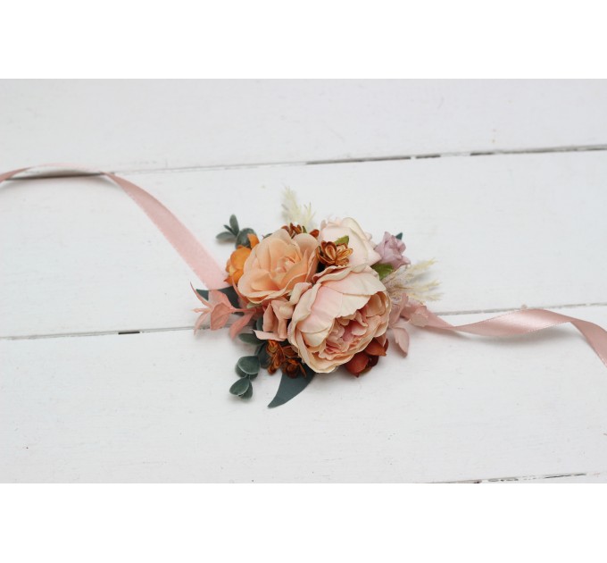 Wedding boutonnieres and wrist corsage in orange blush pink color scheme. Flower accessories. 5071