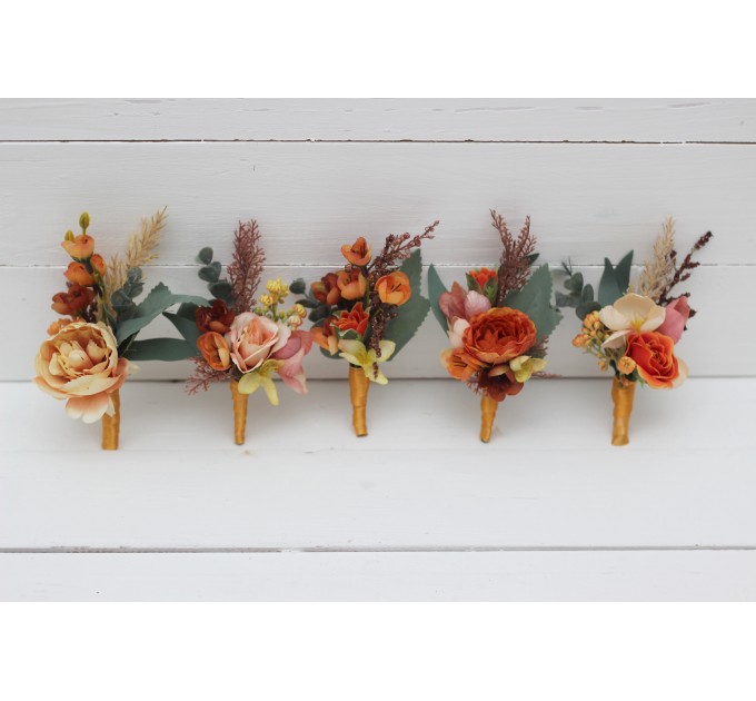 Wedding boutonnieres and wrist corsage in orange rust peach color theme. Flower accessories. 0001