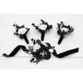 Wedding boutonnieres and wrist corsage in black and white color scheme. Flower accessories. 5086
