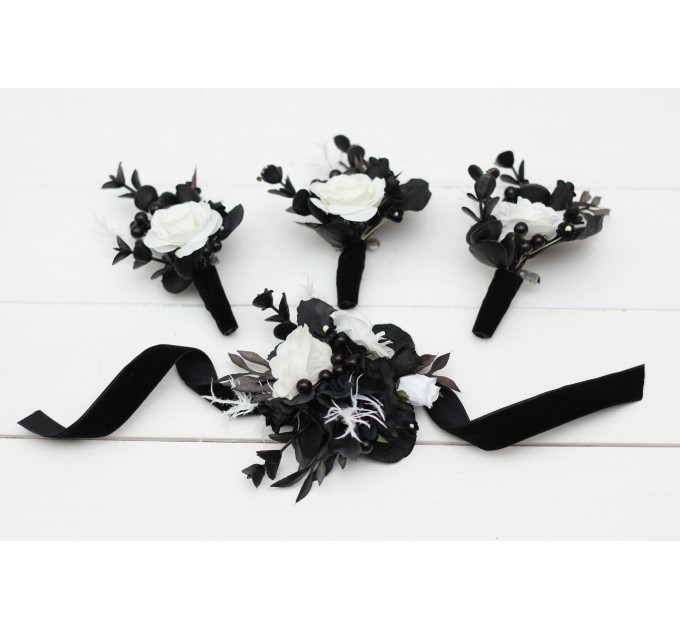 Wedding boutonnieres and wrist corsage in black and white color scheme. Flower accessories. 5086