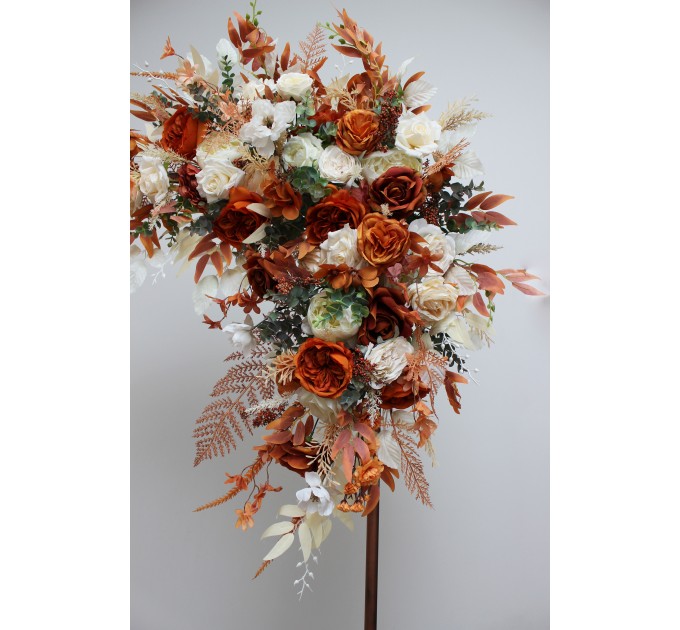  Flower arch arrangement in burnt orange ivory colors.  Arbor flowers. Floral archway. Faux flowers for wedding arch. 5107