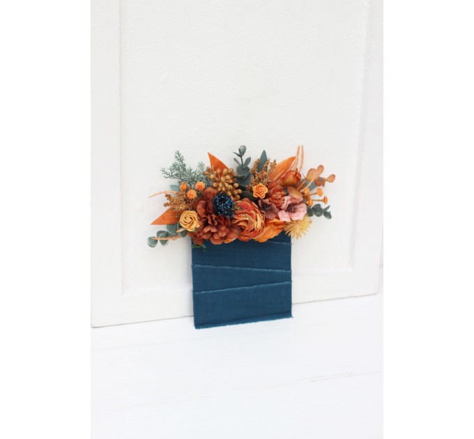 Pocket boutonniere in rust teal color scheme. Square flowers. Flower accessories. 5209