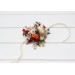 Wedding boutonnieres and wrist corsage in rust orange cream color scheme. Flower accessories. 5179