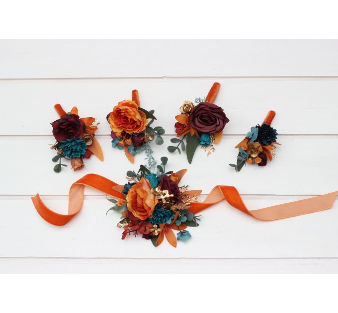 Wedding boutonnieres and wrist corsage in teal rust burgundy gold color scheme. Flower accessories. 5311