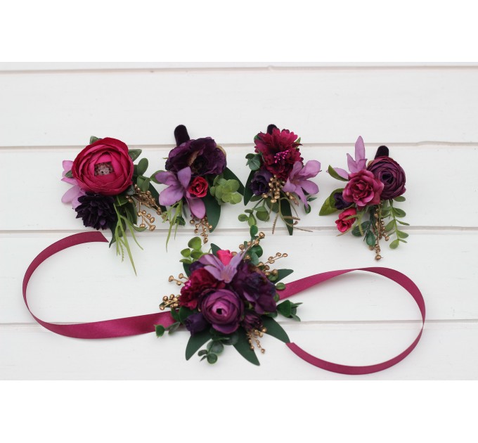 Wedding boutonnieres and wrist corsage in purple magenta gold color scheme. Flower accessories.5273