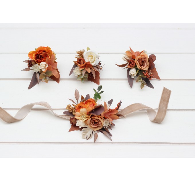Wedding boutonnieres and wrist corsage in orange ivory rust terracotta color scheme. Flower accessories. 5140