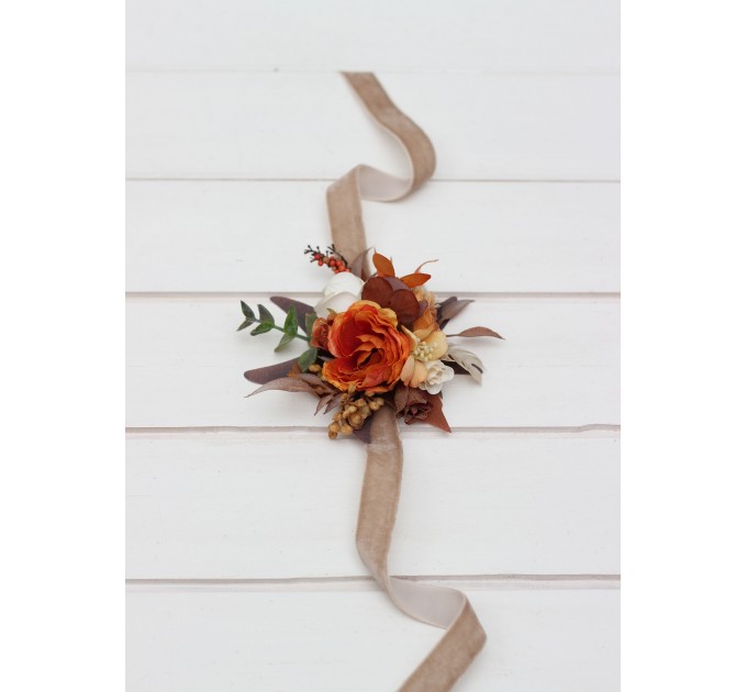 Wedding boutonnieres and wrist corsage in orange ivory rust terracotta color scheme. Flower accessories. 5140