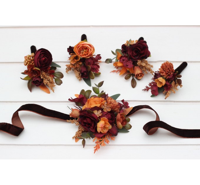 Wedding boutonnieres and wrist corsage in burgundy orange rust brown color scheme. Flower accessories. 5330