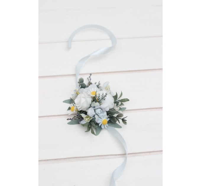 Wedding boutonnieres and wrist corsage in white sky blue color scheme. Flower accessories. 5253