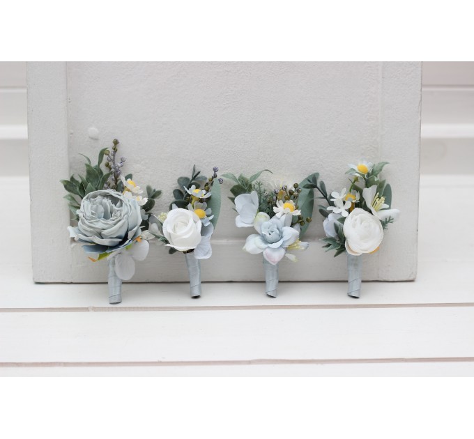 Wedding boutonnieres and wrist corsage in white sky blue color scheme. Flower accessories. 5253