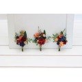 Wedding boutonnieres and wrist corsage in burgundy navy blue and rust color scheme. Flower accessories. 5343
