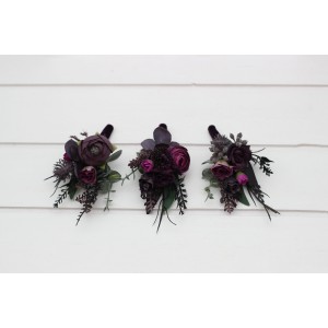 Wedding boutonnieres and wrist corsages in a black, purple, and magenta color palette. Floral accessories for a bold and elegant look.  5370