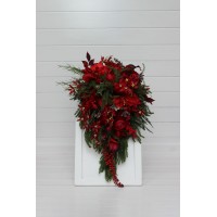 Winter cascading wedding bouquet with red flowers and pine branches. Bridal flowers. Artificial flowers bouquet.  5438
