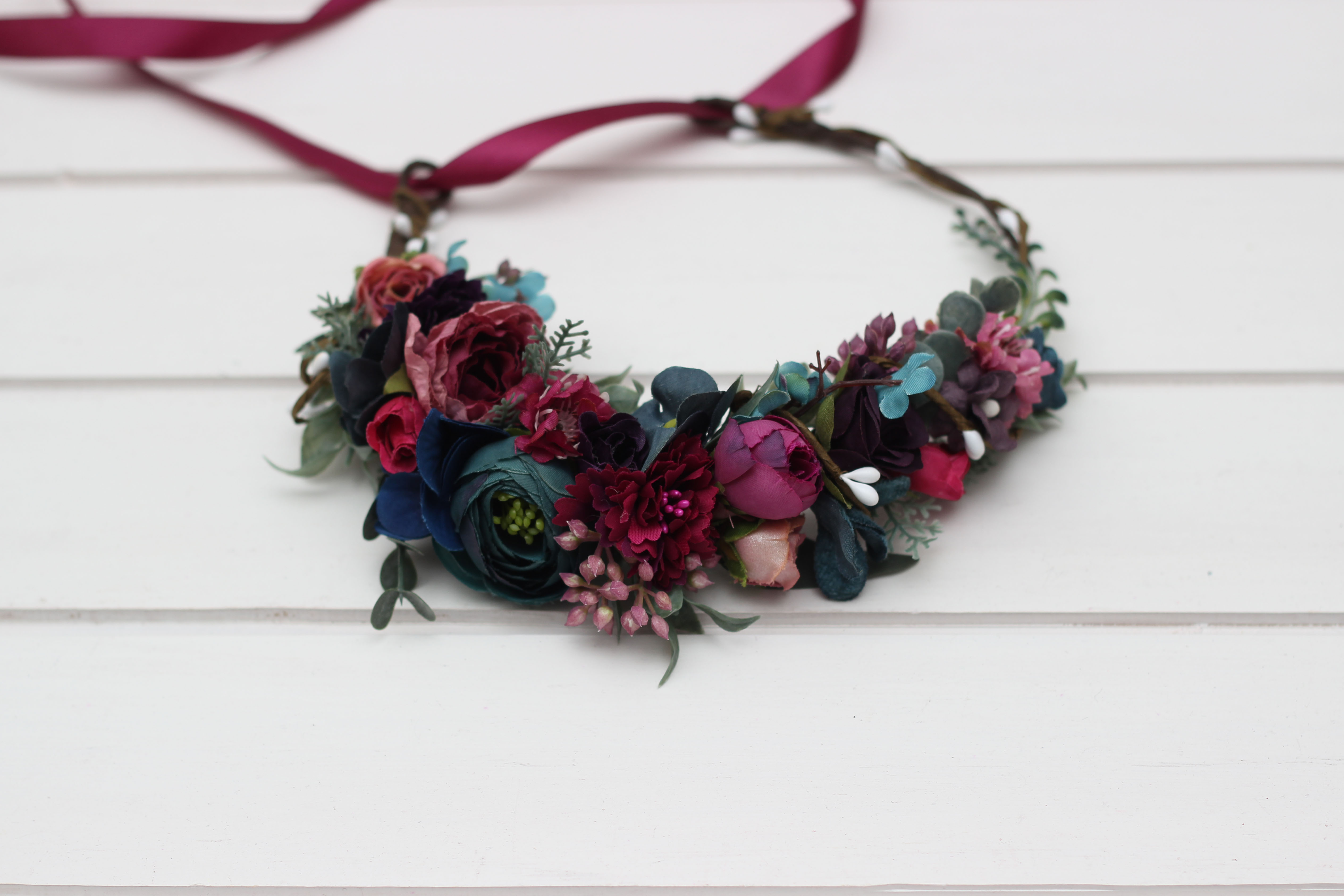 Jewel magenta wedding floral arch