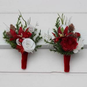 Red and white boutonnieres for a winter wedding. 5440