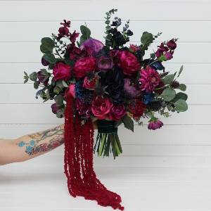 Jewel tone wedding bouquets. Bridal bouquet in  deep shades of navy blue, magenta, fuchsia, purple, and emerald green. Faux flowers. Bridesmaid bouquet. 5416