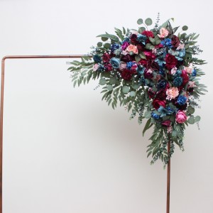 Flower arch arrangement in jewel-tone color scheme. Emerald green purple magenta teal navy blue colors. Arbor flowers. Floral archway. Faux flowers for wedding arch. 5055 Flower arch arrangement in jewel-tone color scheme. Emerald green purple magenta teal navy blue colors. Arbor flowers. Floral archway. Faux flowers for wedding arch. 5055